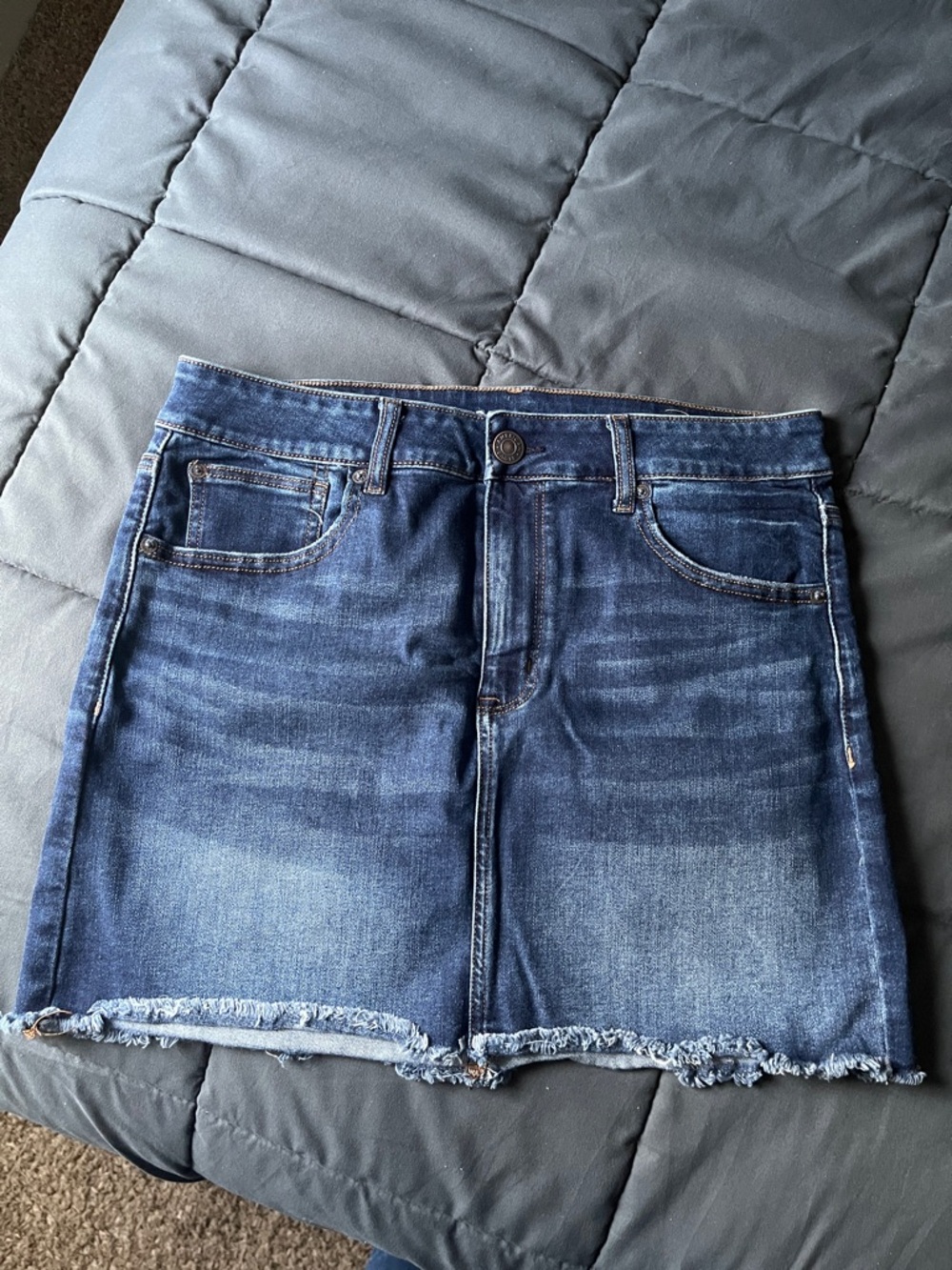 American Eagle Denim Mini Skirt - Distressed Hem in Medium Wash Blue